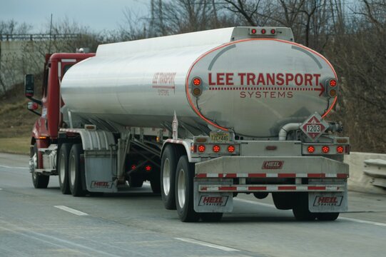 Wilmington, Delaware, U.S - Dec 26, 2025 - The Lee Transport tanker hauls flammable cargo under hazmat placard 1203