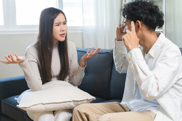 Breakup and depressed, asian young quarrel couple love fight relationship in trouble. Different people are emotion angry. Argue wife has expression upset with husband. Problem of family people.