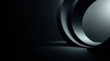 Black and white photo of a curved line. The photo is of a piece of paper that is curled up and has a dark color