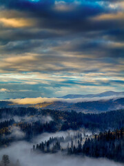Fototapeta premium Sunny Autumn Carpathians with Puffy White During The Sunset