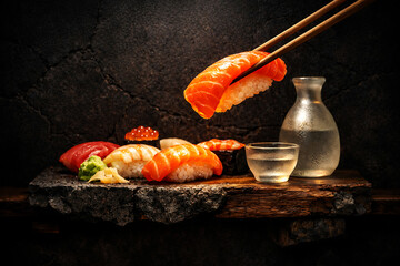 Luxury Salmon Sushi With Chopsticks And Clear Drink On Rustic Shelf