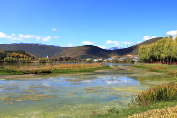 around the lake in front of the beautiful Songzanlin Monastery in Shangri-La, Yunnan Province, China