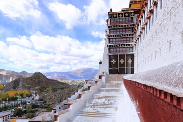 Potala Palace, Lhasa, Tibet, China: equipment for the renovation work at the Palace, white paint used by local workers, residents and volunteers