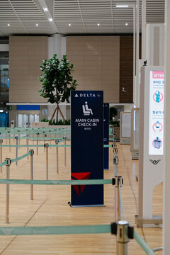 December 27, 2025, Incheon, South Korea - A Delta Air Lines main cabin check-in sign stands in an empty queue area at Incheon International Airport Terminal 2.