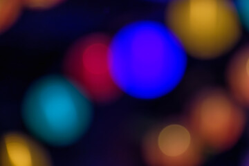 カラフルな光がぼけた幻想的な抽象背景