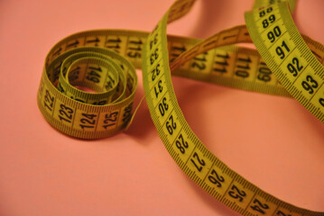 diet concept with measure tape. Flexible centimeter ruler for sewing and weight loss concept