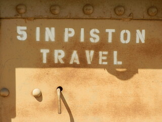 A sign stenciled onto a train car