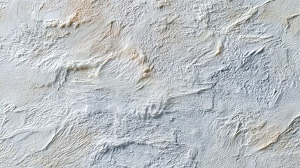 Fototapeta premium A close-up aerial view, depicting an abstract, textured landscape with shades of white, beige, and blue. It resembles a weathered terrain