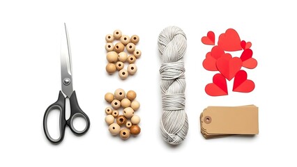 A flat lay arrangement showcases crafting supplies including scissors wooden beads twine hearts and a tag