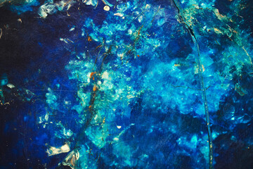 Blue and yellow stone on the cut. Beautiful mineral background