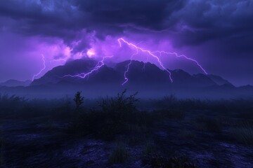 Dramatic purple lightning strikes over dark mountains during a nighttime storm