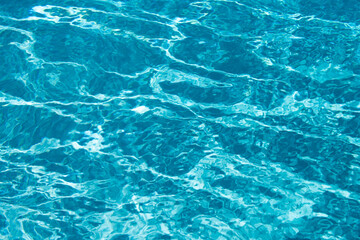 Blue ripped water in swimming pool, water pool texture and surface water backgraund.