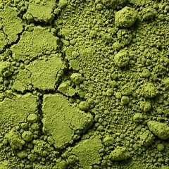 Obraz premium Close-up of vibrant green matcha tea powder showing its fine texture and earthy color