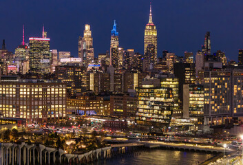 NYC skyline night view. New York skyline. New York City landscape skyscrapers. New York City at night. New York City panoramic skyline. Manhattan night view.