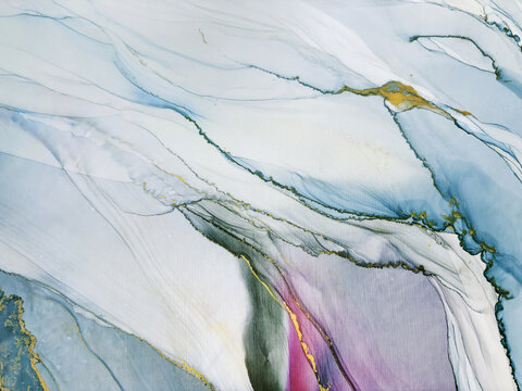 Abstract blue with pink hand made aquarelle background. Beautiful watercolor artwork made with gold and alcohol ink. Blue watercolor fluid art texture resembles marble, water, ocean, sea, air, flow.