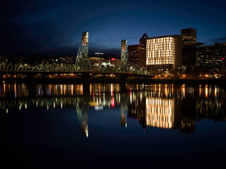 Hawthorne Bridge and Portland, Oregon reflected in the Willamette River at Evening