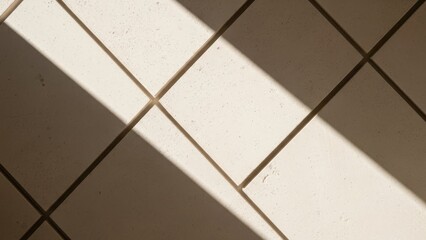 Beige tiled floor with diagonal shadows