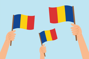 Human hands raising flags of Romania. Vector illustration of Romanian flags in flat style on blue background.