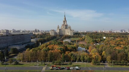 Drone ascending vertically with Moscow State University in background