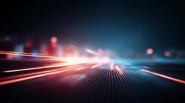 Abstract, angled view of illuminated lines in red and blue gradients with a dark, blurred background