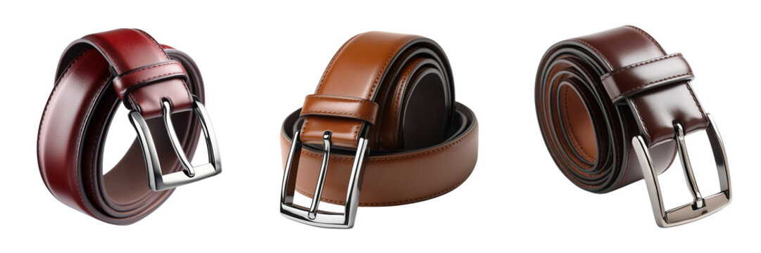 Three rolled leather belts in brown and burgundy with silver buckles isolated on a transparent background