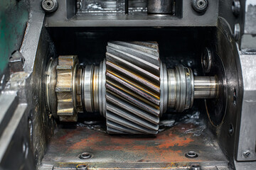Close-up of a Heavy Duty Helical Transmission Gear Inside an Industrial Gearbox