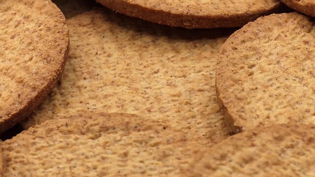 Sweet crunchy butter cookies texture, delicious round biscuits close-up. Food background