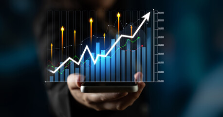 A businessman presents a smartphone displaying a dynamic financial growth graph with rising arrows, symbolizing success and opportunities in the digital economy. Scalp