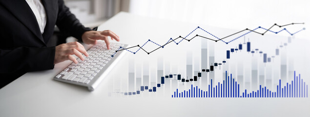 A professional business person analyzes financial data while typing on a keyboard with an overlay of graphs and charts showing market trends in a modern office. Scalp