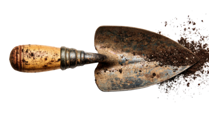 Hand trowel with soil for gardening, planting, and digging concepts on transparent background for spring and nature themes