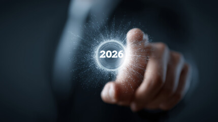 A businessman interacts with a digital interface displaying the year 2026