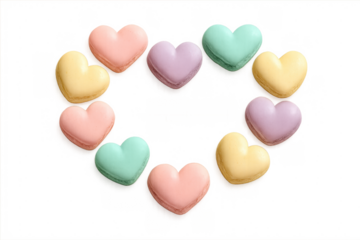 Pastel heart macarons forming love shape on transparent background
