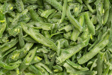 Frozen French-style green beans - top view closeup background and texture