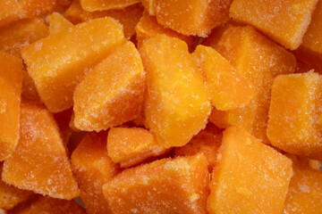 frozen butternut squash - closeup background and texture