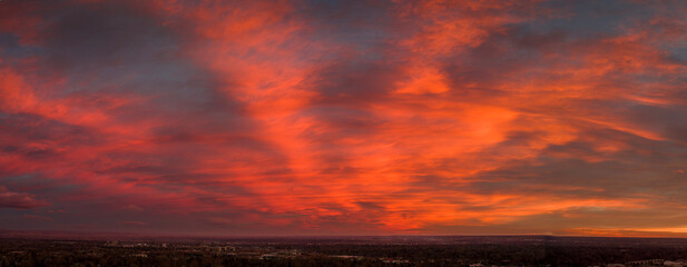 dramatic sunrise sky over plains in northern Colorado, aerial view