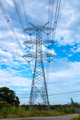Photograph of a large electricity Transmission Tower set against a vibrant blue sky in the town of Kemps Creek in New South Wales, Australia.
