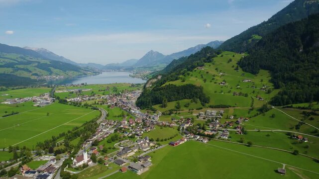 Aerial view around the city Giswil beside the the lake Sarnen in Switzerland on a sunny day in summer. 