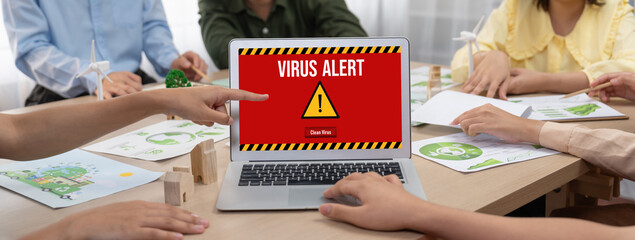 Virus warning alert on computer screen detected brisk cyber threat , hacker, computer virus and malware