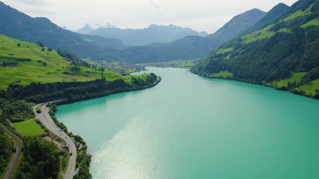 Aerial view around the city and lake Lungern in Switzerland on a sunny day in summer.