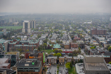 Fototapeta premium Cityscape on a cloudy day with residential and commercial buildings
