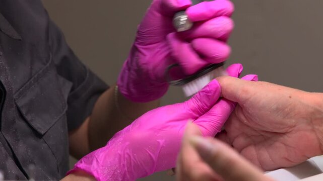 Detailed Nail Shaping, Close Examination Of Professional Technician Shaping Acrylic Nails In Salon Setting. Media