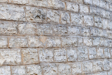 Stone brick wall texture with shallow depth of field