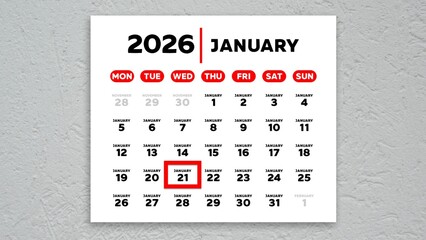 The date January 21st marked with a red cursor on the wall calendar 2026