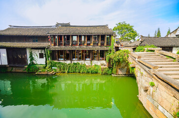 View of the famous water town called Zhouzhuang on a sunny day near Suzhou and Shanghai in China.