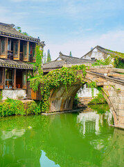 View of the famous water town called Zhouzhuang on a sunny day near Suzhou and Shanghai in China.