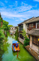 View of the famous water town called Zhouzhuang on a sunny day near Suzhou and Shanghai in China.