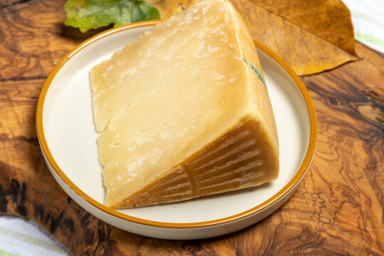 Italian Rodez hard cheese produced with raw cow&rsquo;s milk, riped 6 months, cheese tasting in Italy