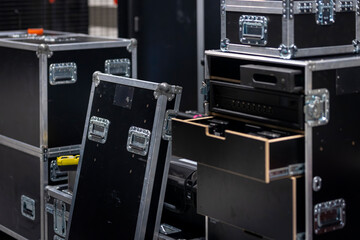 Open and stacked professional road cases with aluminum edges for equipment storage