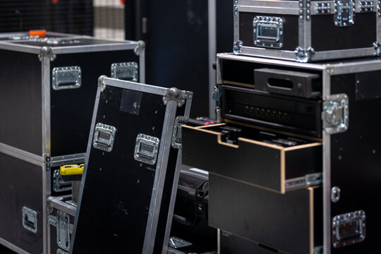 Open and stacked professional road cases with aluminum edges for equipment storage