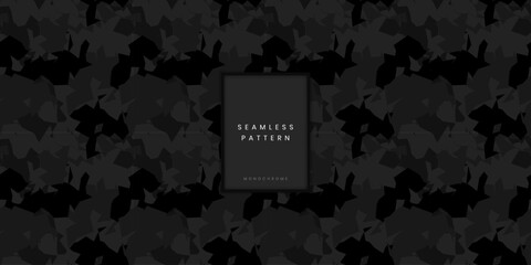 Seamless monochrome camouflage pattern or shard camo background with sharp angular shapes in black and dark grey for futuristic military techwear and modern tactical gear or denim © gegen